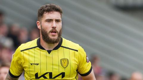 Ryan Sweeney in action for Burton Albion