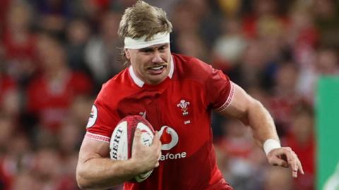 Aaron Wainwright attacks for Wales