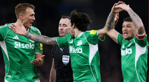 Newcastle players protest in the FA Cup