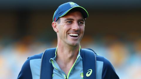 Pat Cummins looks on during a training session in Brisbane