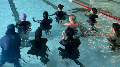 Muslim women in a swimming pool