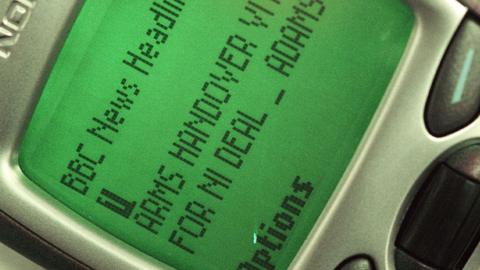 News message on a mobile phone display.