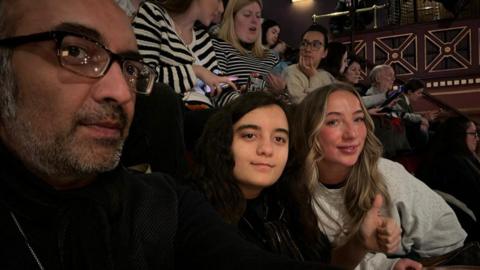 Neil Kulkarni, pictured with daughters Sofia and Georgia (right)