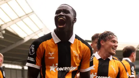 Nobel Mendy celebrates