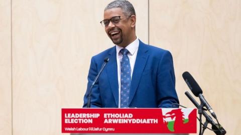 Vaughan Gething at podium after becoming Welsh Labour leader