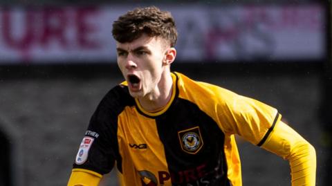 Newport's Joe Thomas celebrates