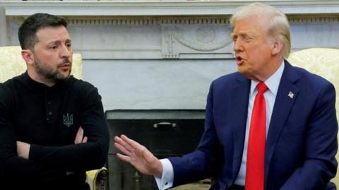 Volodymyr Zelenskiy and Donald Trump are sitting next to each other.