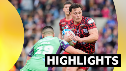 Lachlan Lam of Leigh is tackled by George Hill of Castleford