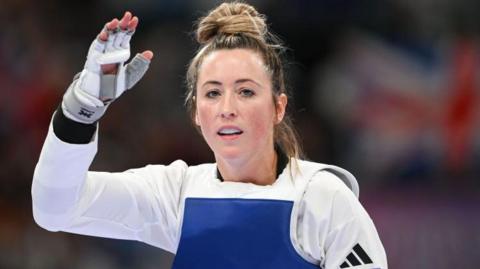 Jade Jones waves at the 2024 Paris Olympics