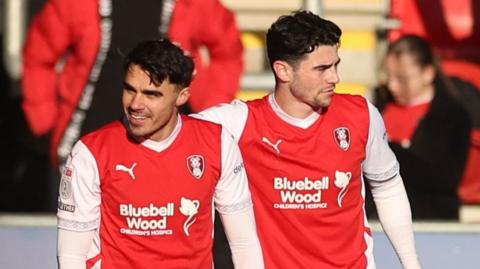 Rotherham players celebrate a goal