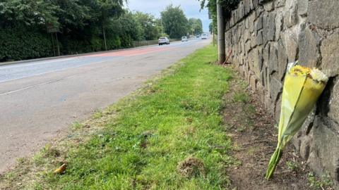 Flowers have been left at the scene of the crash in Magherafelt