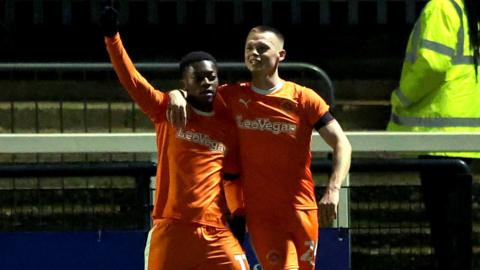 Karamoko Dembele celebrates his goal for Blackpool against Bromley in the FA Cup