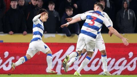 QPR celebrate a goal at Hull