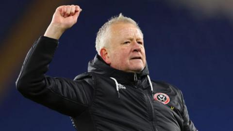 Chris Wilder, manager of Sheffield United celebrates in front of the fans after the Sky Bet Championship match between Cardiff City FC and Sheffield United FC at Cardiff City Stadium on December 21, 2024 in Cardiff, Wales.