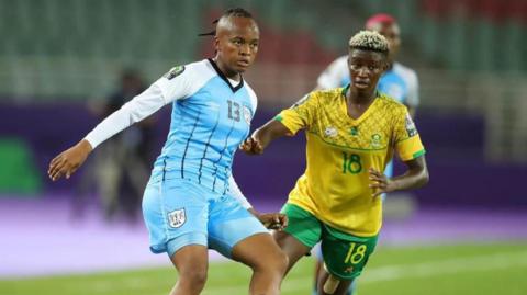 Keitumetse Dithebe playing football for Botswana