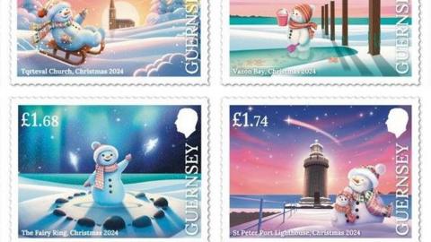 Four of Guernsey's Christmas stamps. All have 'Guernsey' written down the right hand side under the head of King Charles III. They show a snowman and snowchild wearing a multi-coloured hat, scarf and gloves. The snowman is on a sledge at Torteval Church, the snowchild is standing in a puddle at Vazon Bay (stamp price no visible in the picture) and standing in The Fairy Ring (£1.68) and both of them are hugging at St Peter Port Lighthouse (£1.74). 