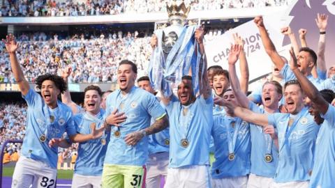 Manchester City captain Kyle Walker lifts Premier League trophy