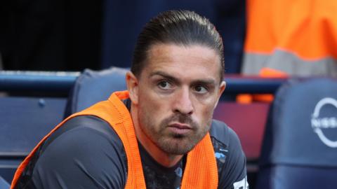 Manchester City winger Jack Grealish sat on the substitutes' bench