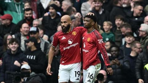Manchester United pair Bryan Mbeumo (left) and Amad Diallo are still waiting to be told if they can play in Monday's Premier League game with Bournemouth at Old Trafford