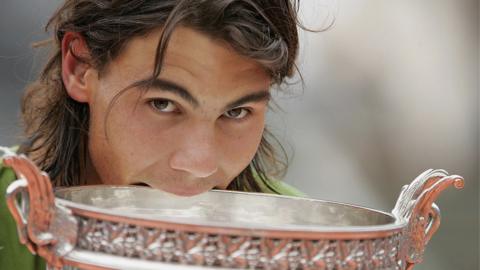 Rafael Nadal with French Open trophy
