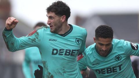 Santiago Bueno celebrates scoring for Wolves at Grimsby in the FA Cup