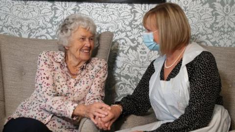 Care home resident Doreen (left) alongside her daughter Sandy at Sunrise of Bassett care home in Southampton, Hampshire