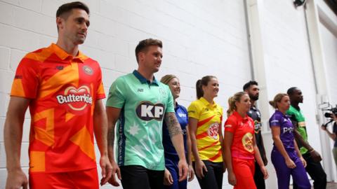 Cricket stars pose in the KP-branded kits of The Hundred tournament