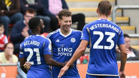 Kasey McAteer is congratulated by his team-mates after putting Leicester City ahead against Rotherham United