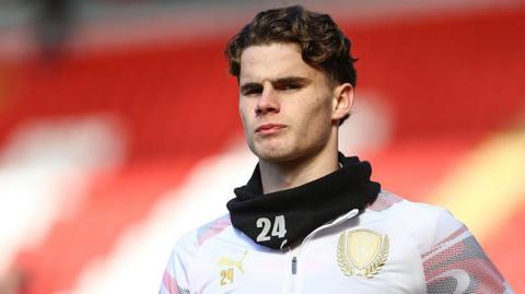 Harry Gray warming-up before a game for Rotherham United