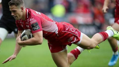 Kieran Hardy goes over for Scarlets' first try