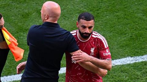 Arne Slot acknowledges Mohamed Salah on the touchline 