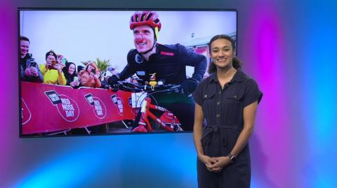 Nina in the studio with Greg James in the screen