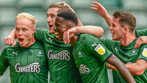 Plymouth Argyle players celebrate a goal