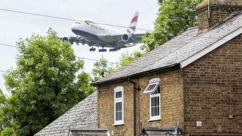 Plane making its approach to Heathrow airport