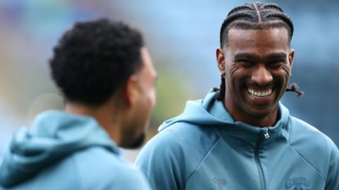 Coventry striker Haji Wright smiles