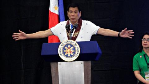 President Rodrigo Duterte speaks during a meeting with banana production businessmen in Davao city, in southern Philippines