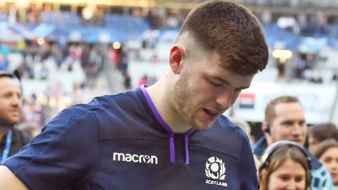 Full-back Blair Kinghorn looks dejected after Scotland's defeat