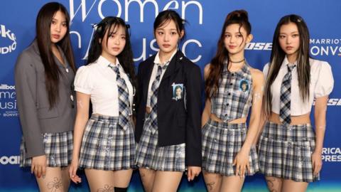 Five members of the K-pop group NewJeans Minji, Hanni, Danielle, Haerin and Heyin