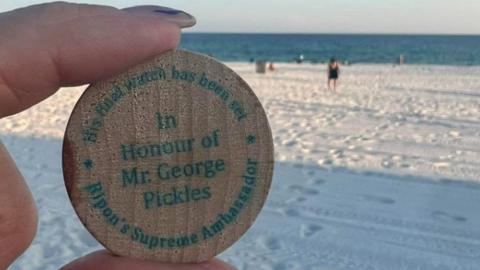 Coin on Florida beach