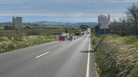 Temporary traffic lights on a road