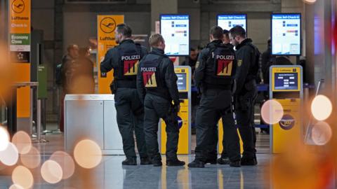 Police in Stuttgart airport, Germany, on 20 December 2018