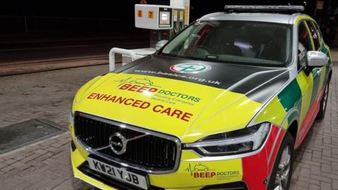 Beep Doctors car at petrol station