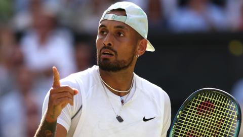 Nick Kyrgios gestures after a point in the Wimbledon men's singles final in 2022