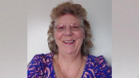 Jane Catchpole smiles at the camera