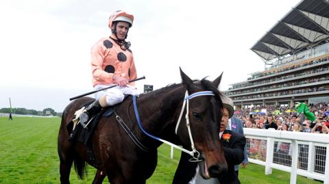 Black Caviar and jockey Luke Nolen after winning the Diamond Jubilee Stakes at Royal Ascot in 2012