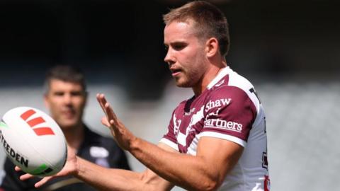 Zane Dunford catches a ball in a pre-season training drill at Manly