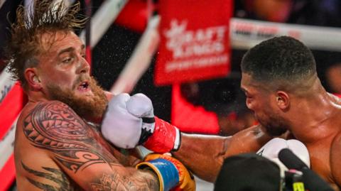 Anthony Joshua punches Jake Paul