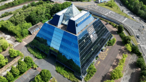 An aerial photo of the Pyramid building and surrounding car park in Stockport.