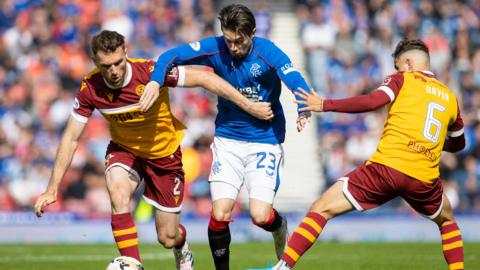 Motherwell's Stephen O'Donnel, Rangers' Scott Wright and Motherwell's Davor Zdravkovski