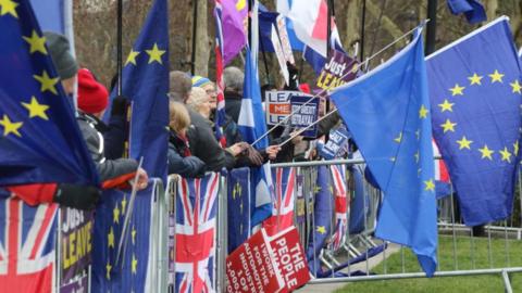 UK and EU Flags outside parliament